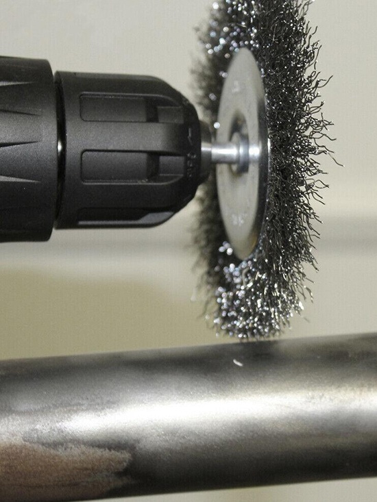 wire wheel on a drill for cleaning bbq grills